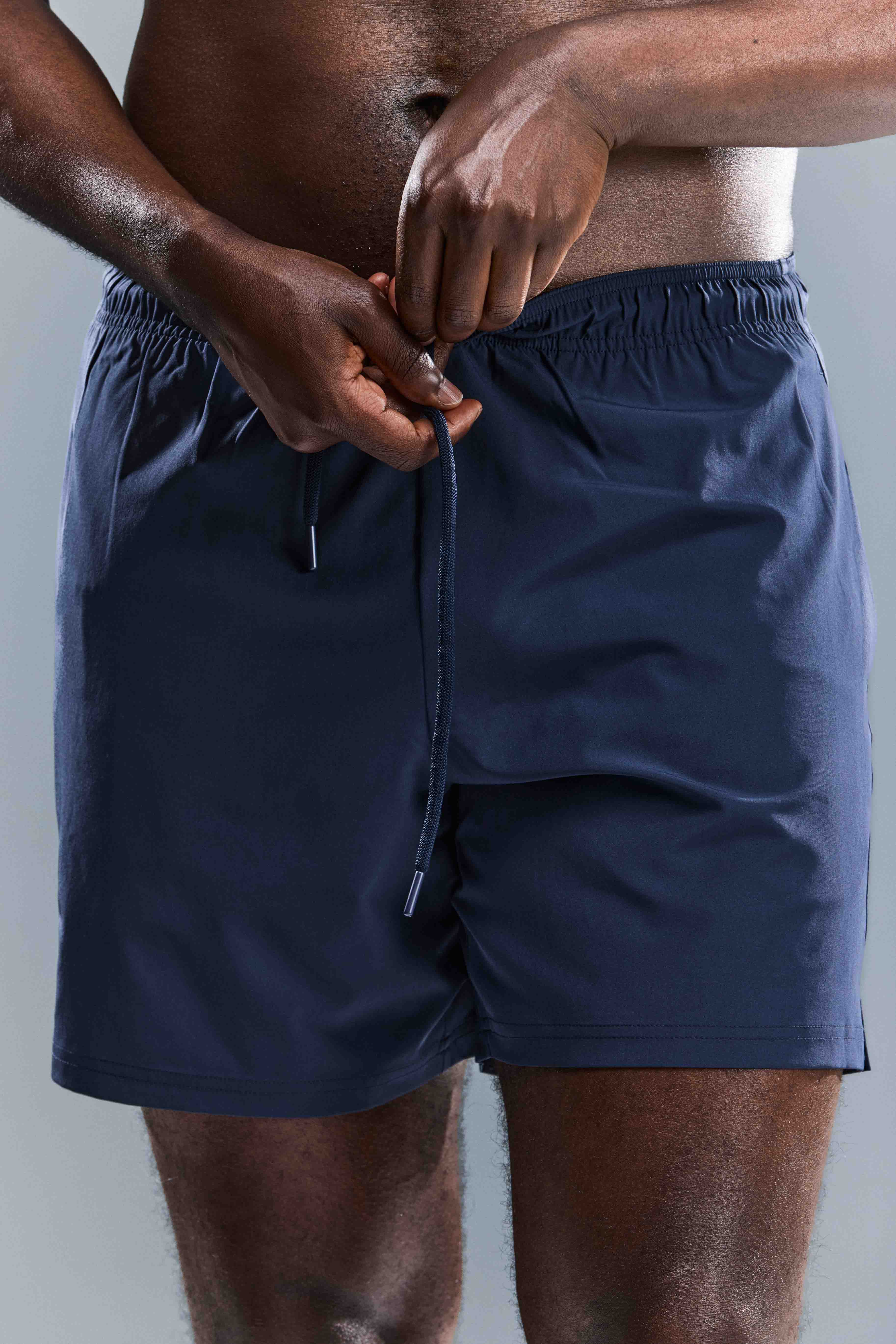 MEN'S MOTION SHORTS - TOASTED NAVY