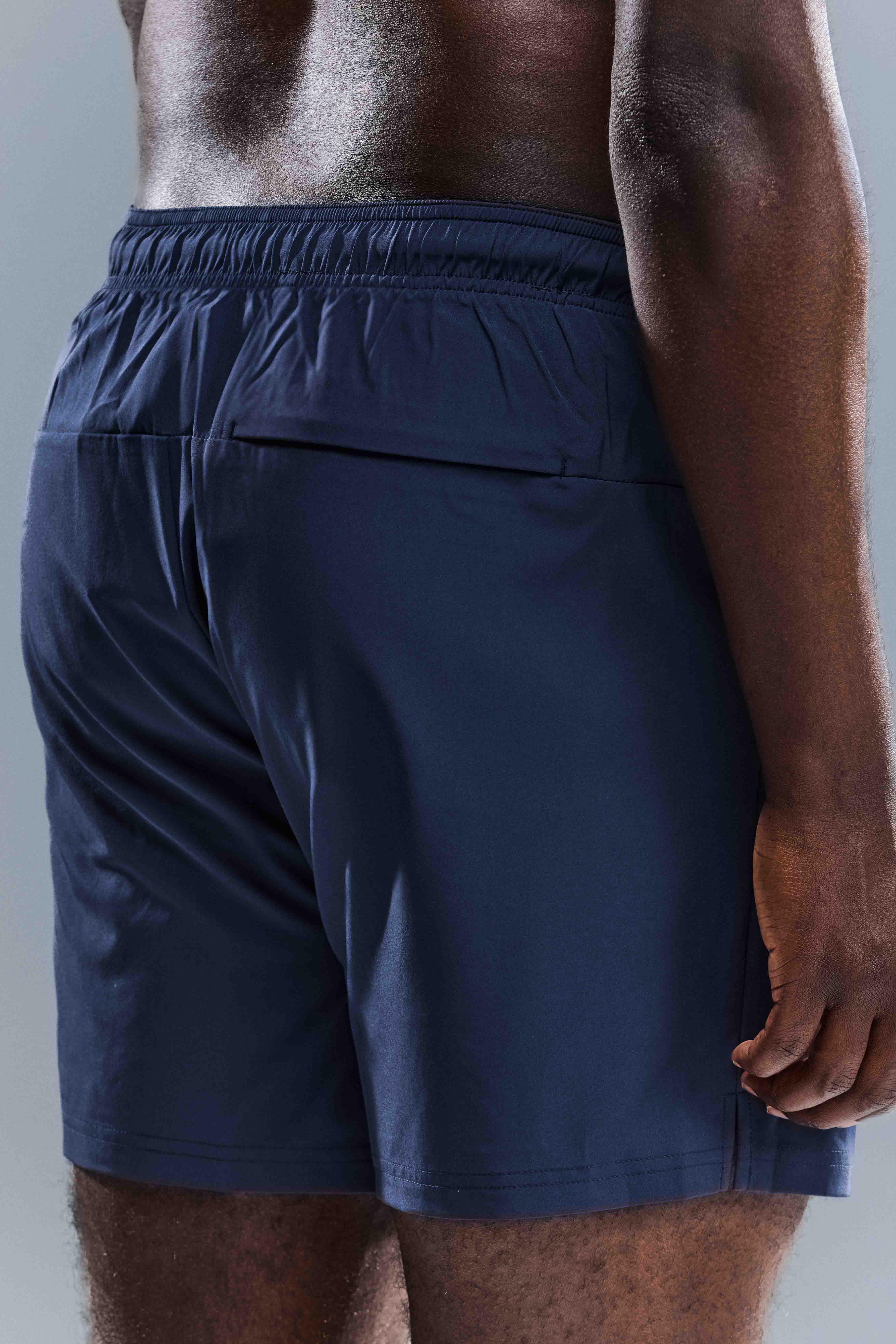 MEN'S MOTION SHORTS - TOASTED NAVY