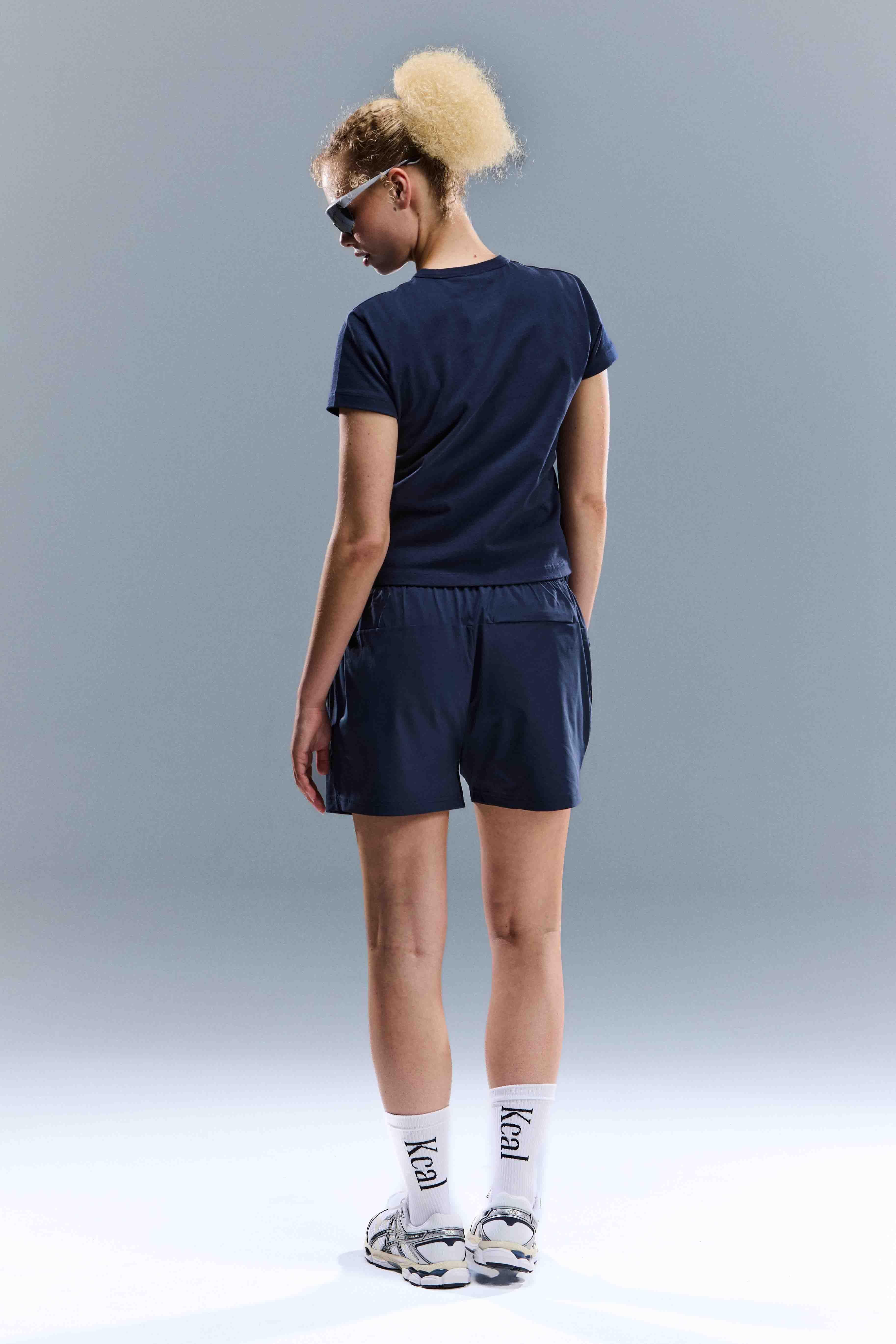 WOMEN'S MOTION SHORTS - TOASTED NAVY