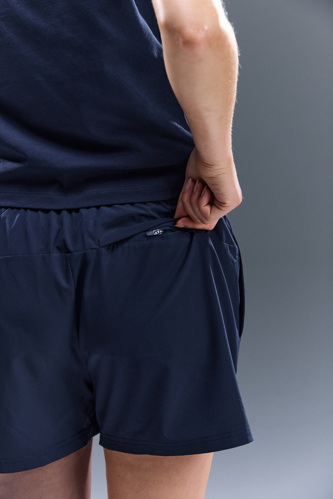WOMEN'S MOTION SHORTS - TOASTED NAVY